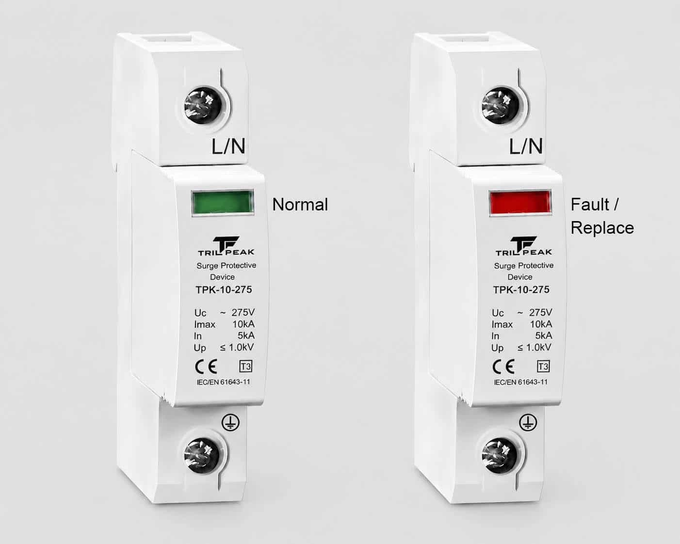 Surge protector status indicator comparison showing mechanical green normal window versus red fault window on a TrilPeak Type 3 SPD per IEC 61643-11